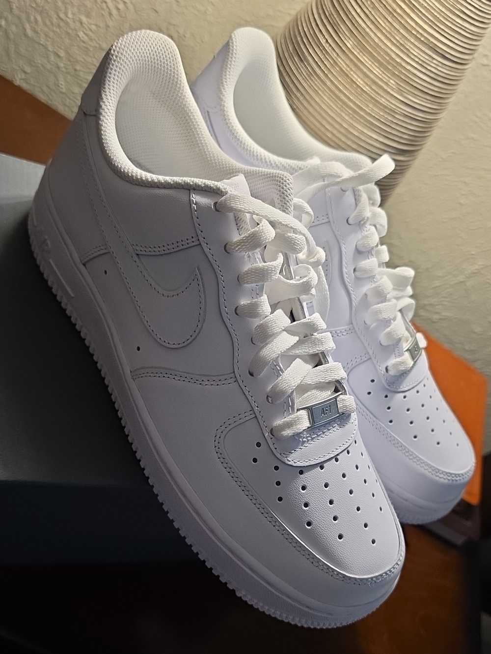 Nike Air Force 1

   All-White Low-Top Leather Sneakers 8.5